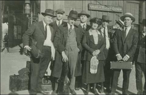 group of travelers waiting for the train