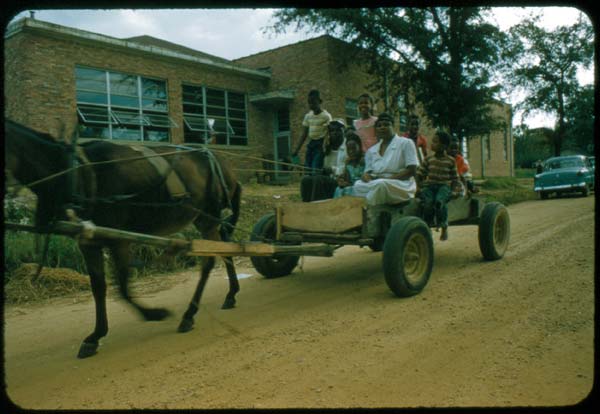 Clay County - West Point School - Children Riding on a Cart