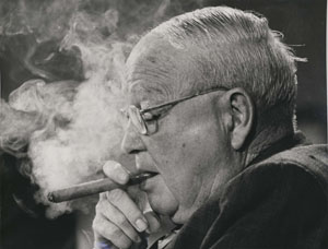 Picture of Eastland smoking a cigar