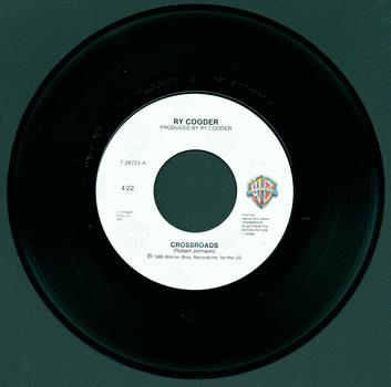 45 rpm sound disc.  45 rpm single for the 1986 film Crossroads.  This single features the Robert Johnson song 'Crossroads' and the Ry Cooder song 'Feelin' Bad Blues.'