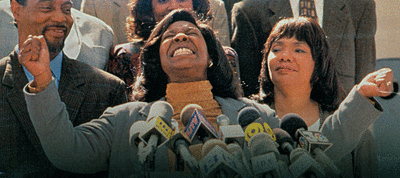 Inside cover of Ghosts of Mississippi DVD showing Whoopie Goldberg as Merlie Evers celebrating the conviction of Byron de la Beckwith.