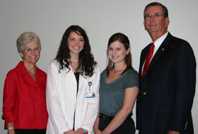 Sarah (left) and Jim Ainsworth, Laura Luther and Katie Sims